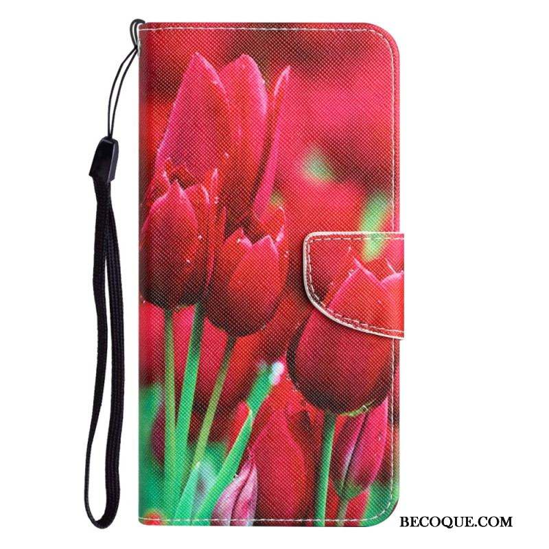 Housse iPhone 15 Déclinaison Florale à Lanière