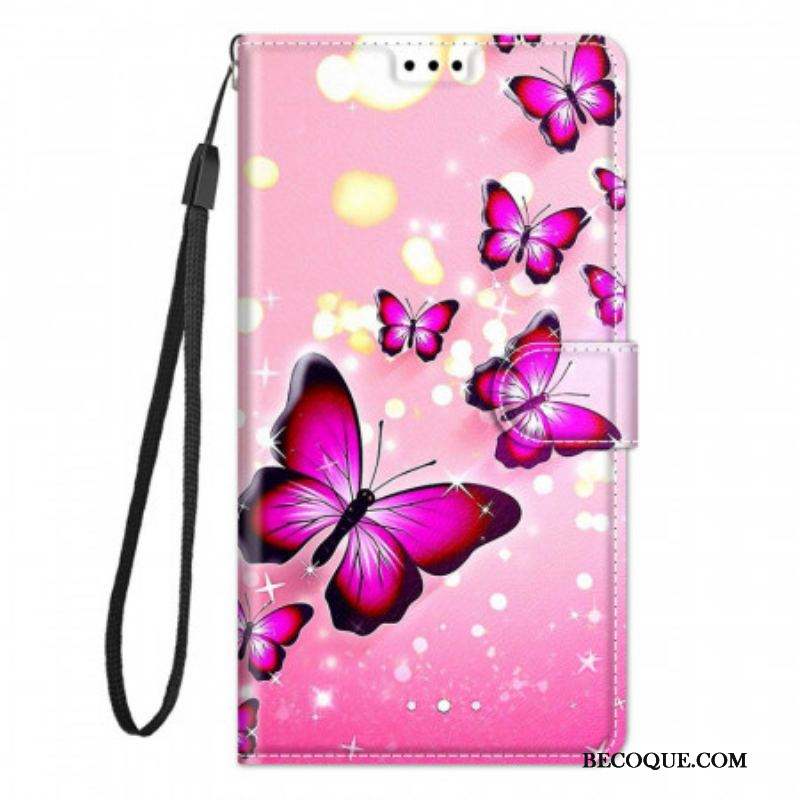 Housse Xiaomi Redmi Note 10 Pro Papillons et Lanière