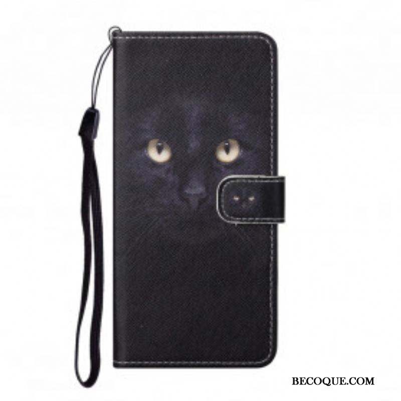 Housse Xiaomi Redmi Note 10 Pro Yeux de Chat Noir à Lanière